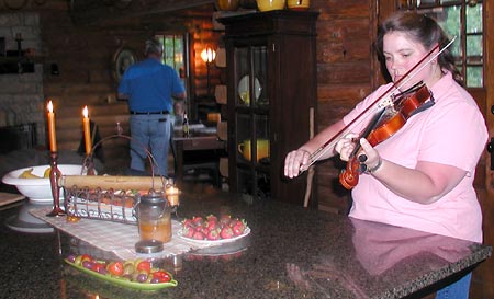 Patty plays fiddle